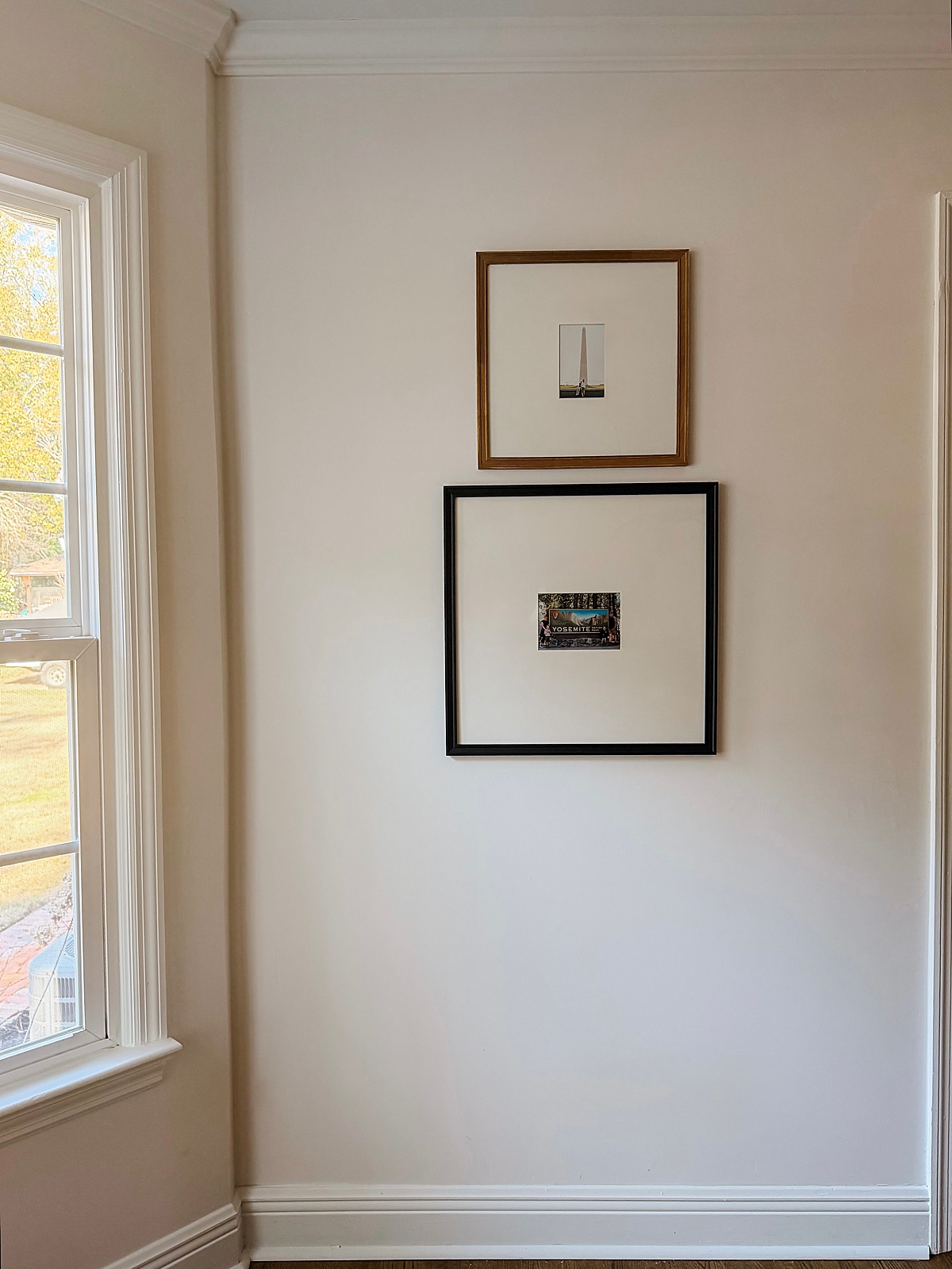 Two pictures hung at the correct height for proper design.